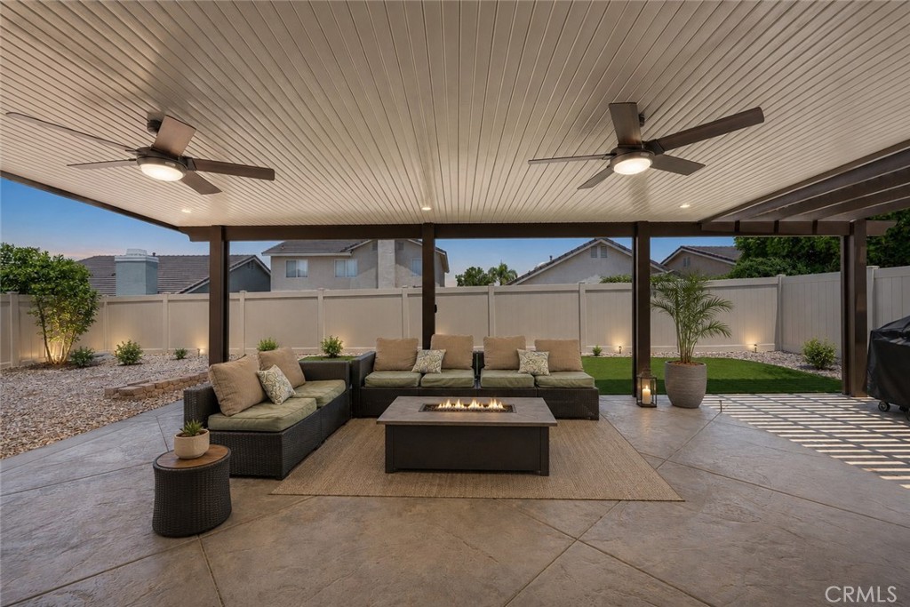 27100 Early Dawn Road Menifee, CA 92584 - Photo 4 of 71 AI Enhanced Night time view of covered patio