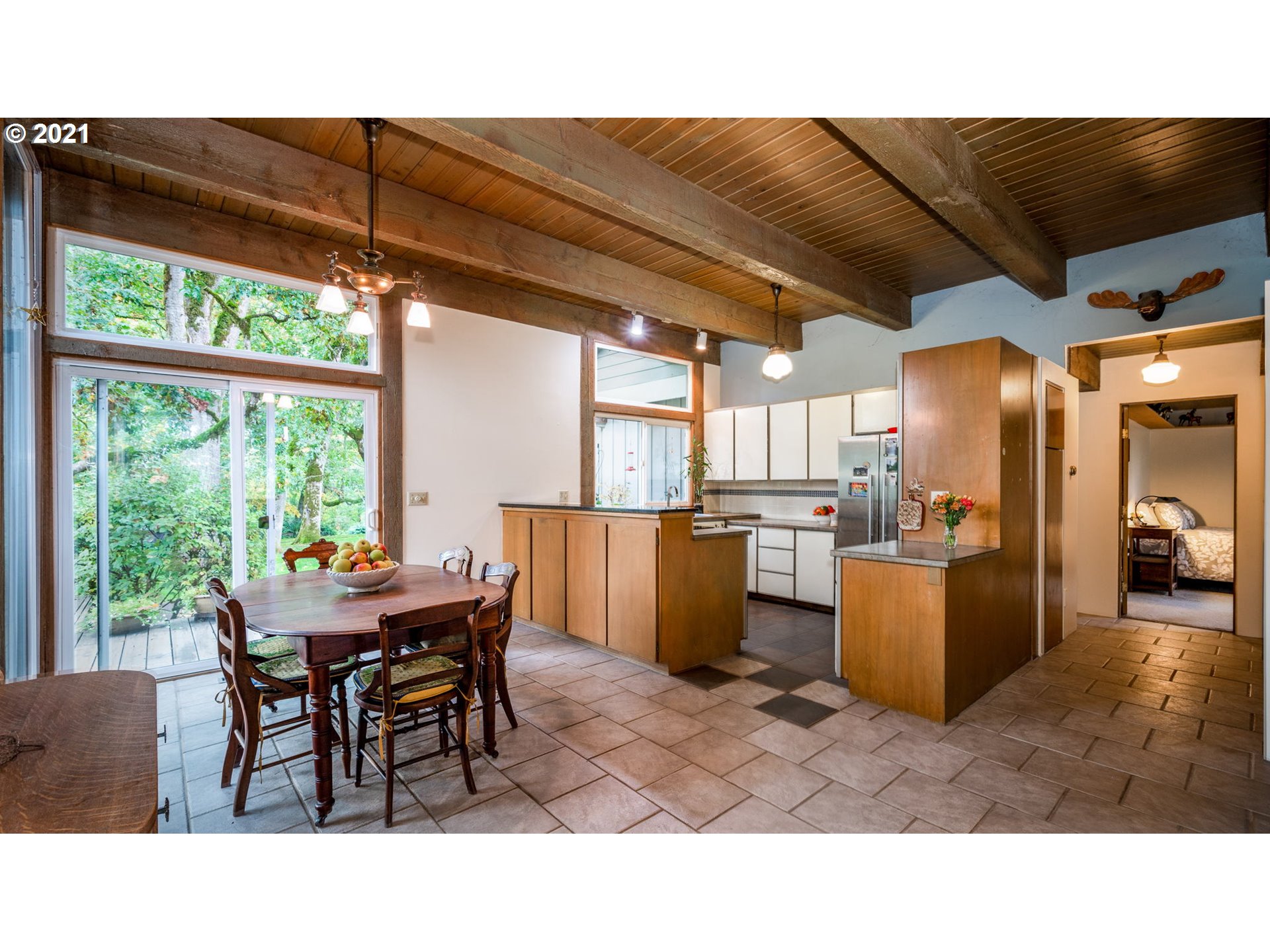 10205 Helmick Road Monmouth, OR 97361 - Photo 19 of 32 a kitchen with a table and chairs in it