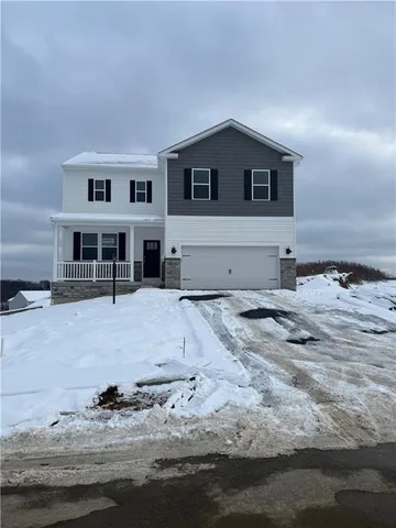 a view of a house with snow