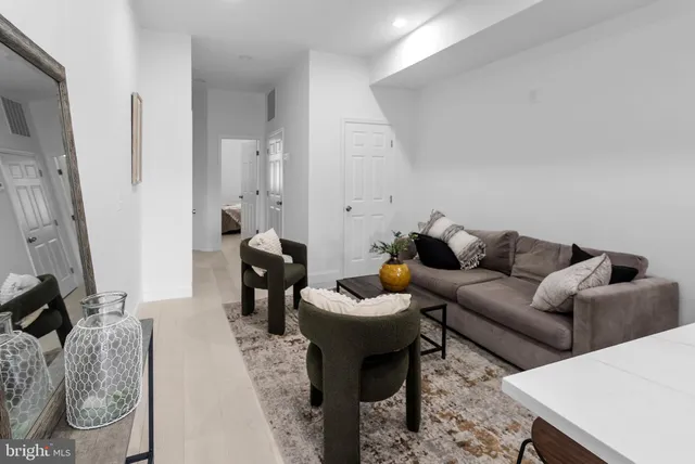 a living room with furniture and a couch