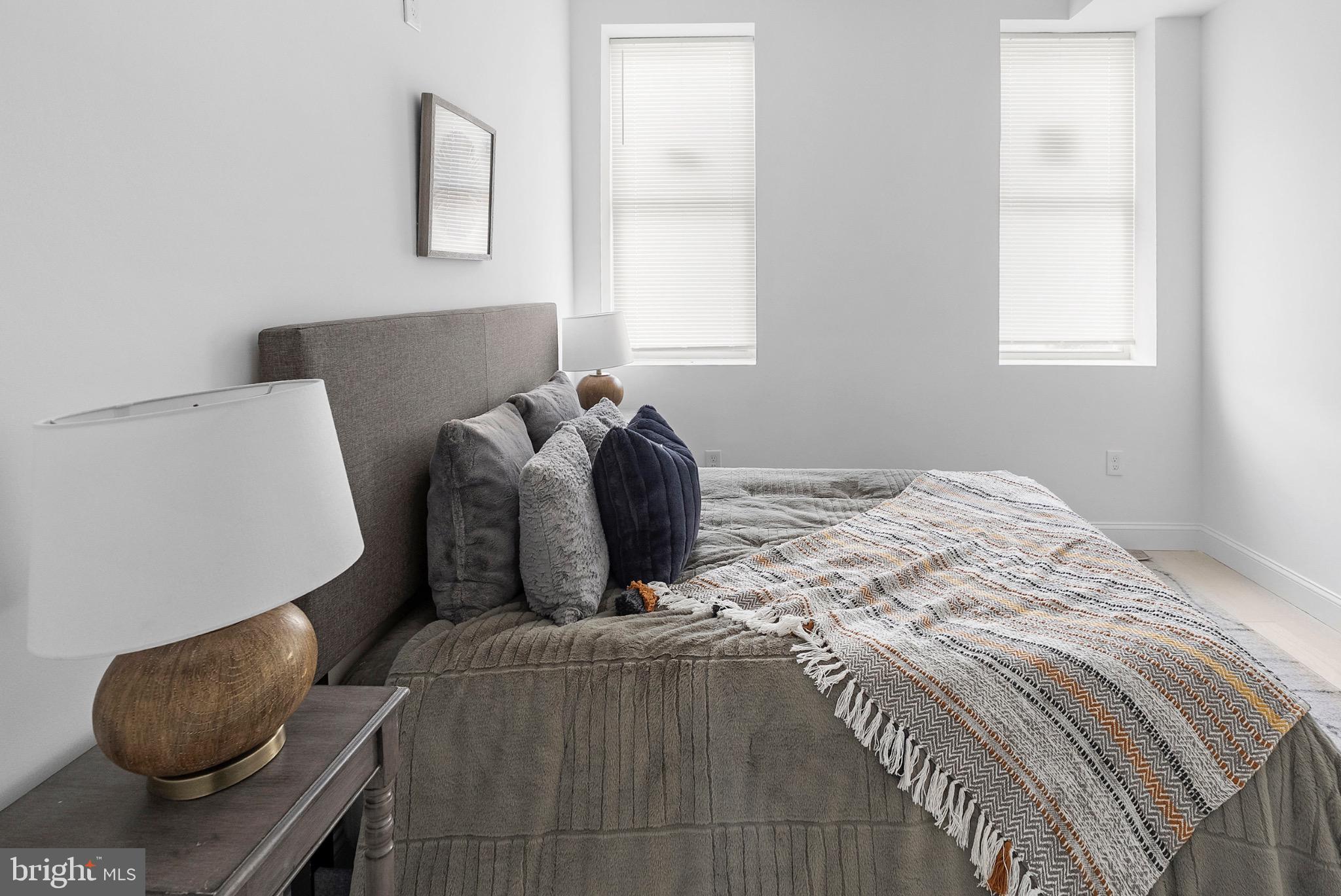 2106 McCulloh Street Baltimore, MD 21217 - Photo 16 of 38 a bedroom with a bed and window