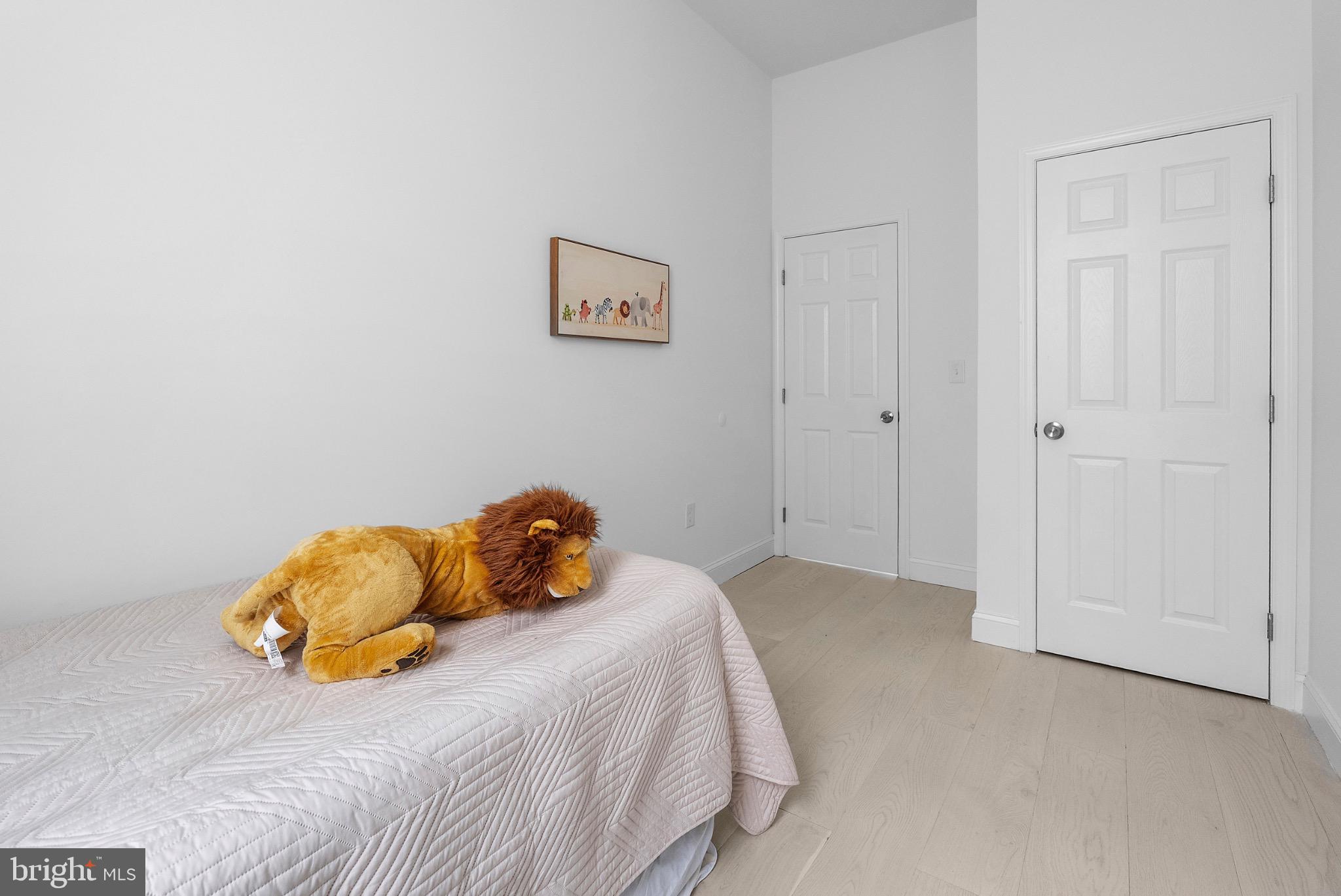 2106 McCulloh Street Baltimore, MD 21217 - Photo 26 of 38 a bedroom with a bed and a window