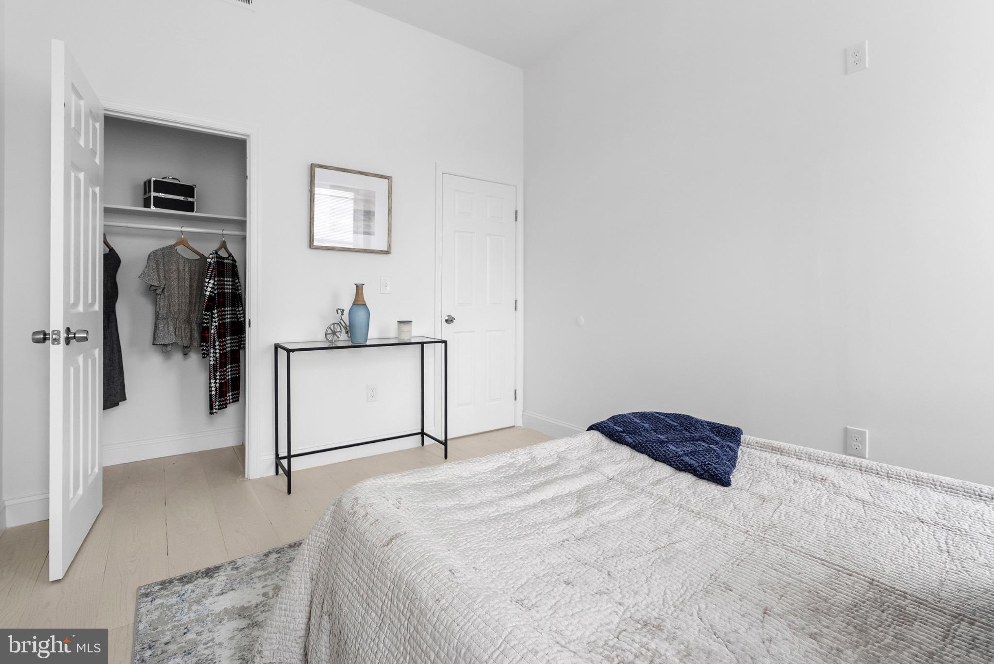 2106 McCulloh Street Baltimore, MD 21217 - Photo 28 of 38 a bedroom with a bed and a view of bathroom