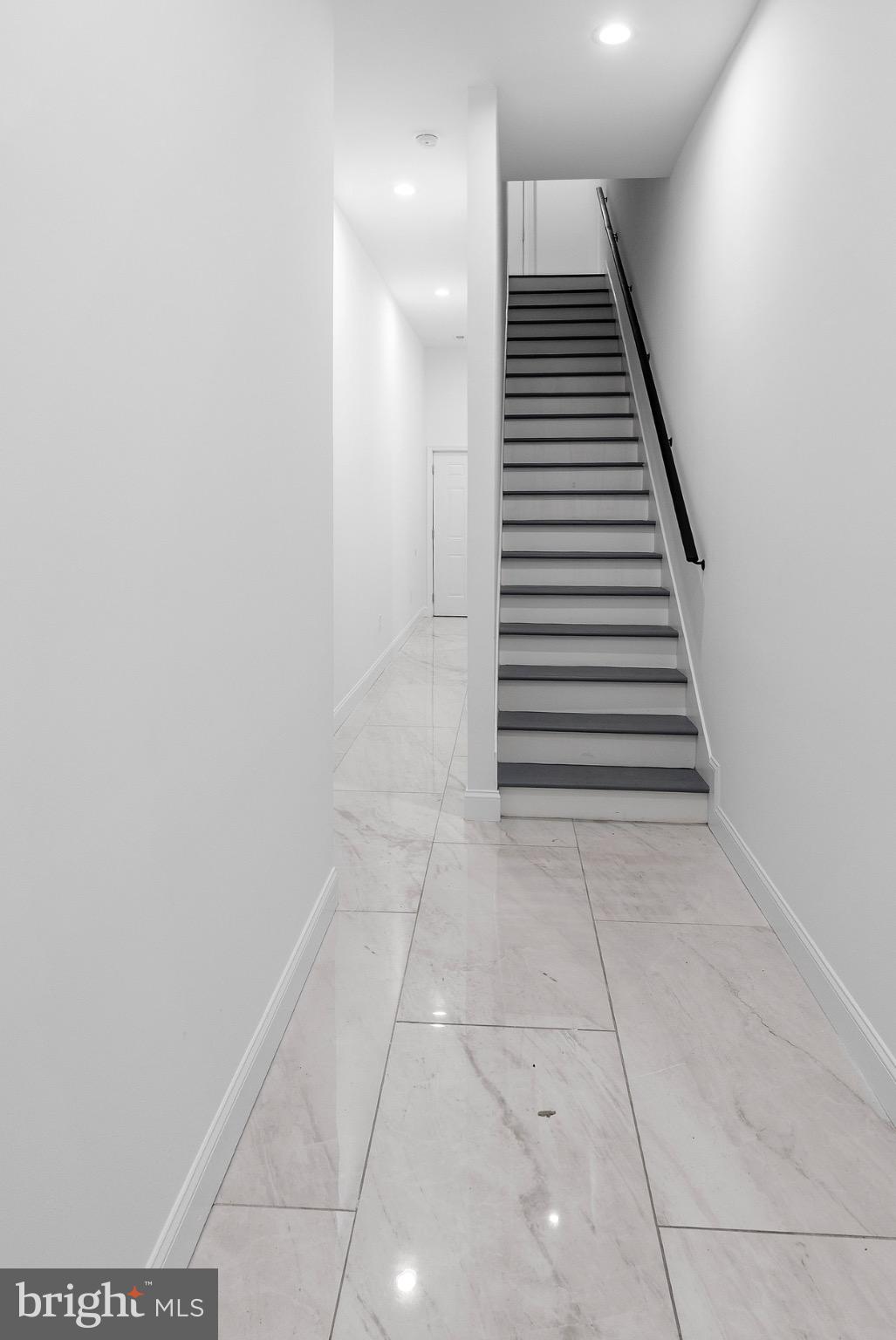 2106 McCulloh Street Baltimore, MD 21217 - Photo 36 of 38 a view of an empty room with stairs