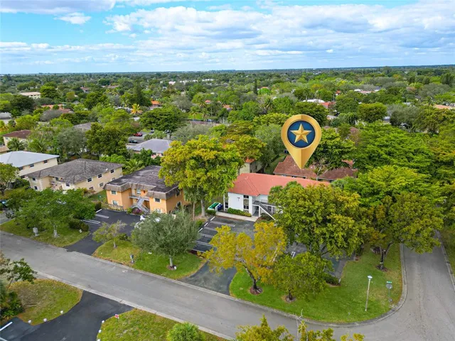 a view of a garden with an outdoor space