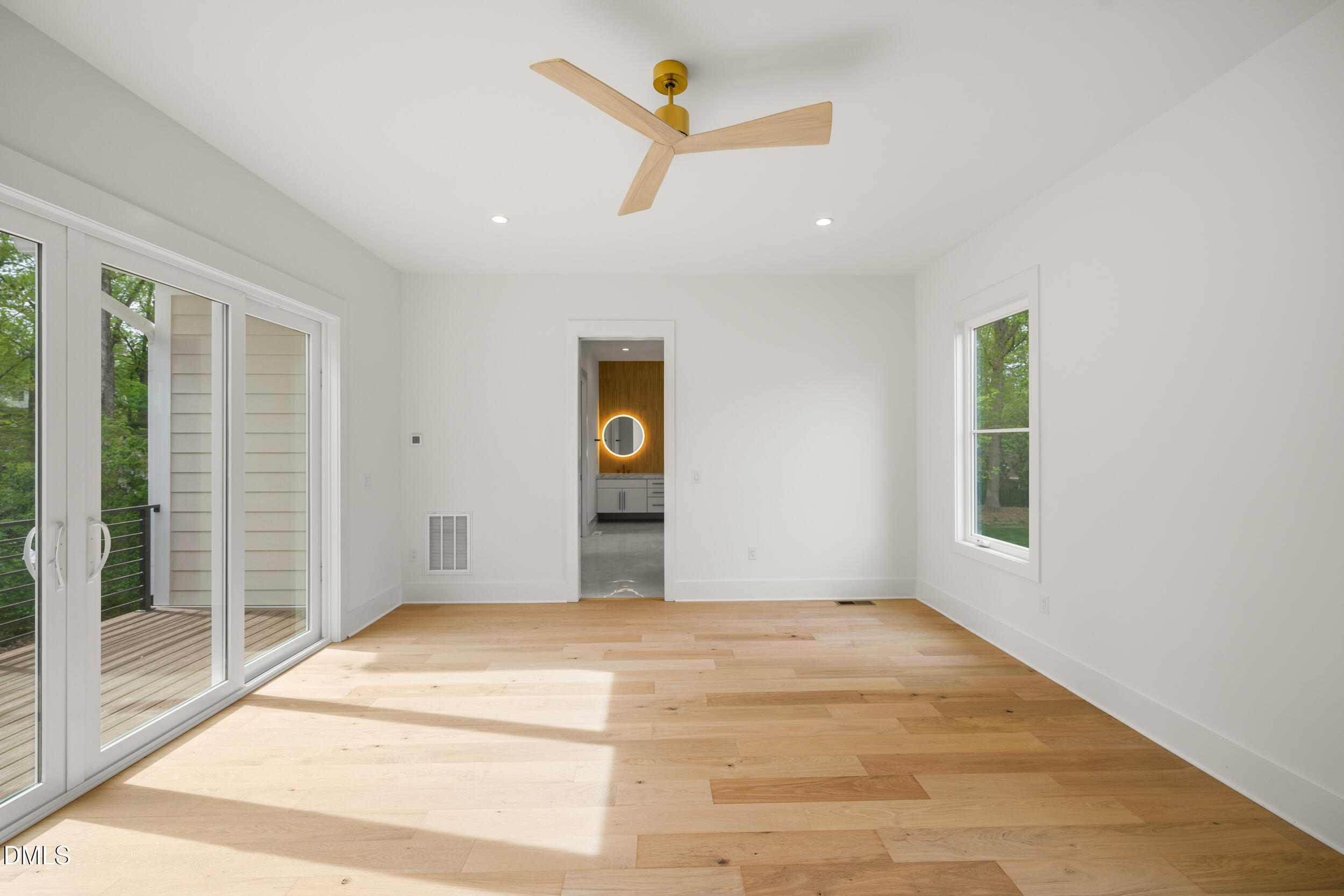 2817 Claremont Road Raleigh, NC 27608 - Photo 30 of 73 a view of a livingroom with a ceiling fan and window