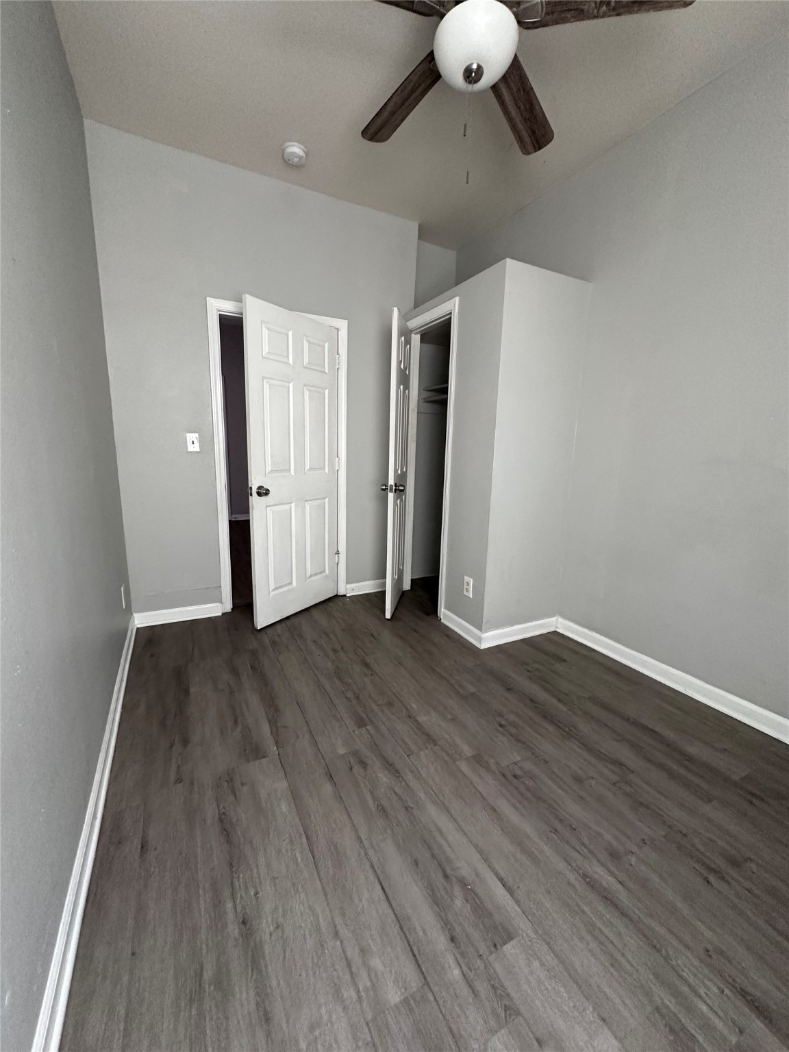 910 37th Street, Unit 3 Galveston, TX 77550 - Photo 16 of 18 a view of an empty room with wooden floor