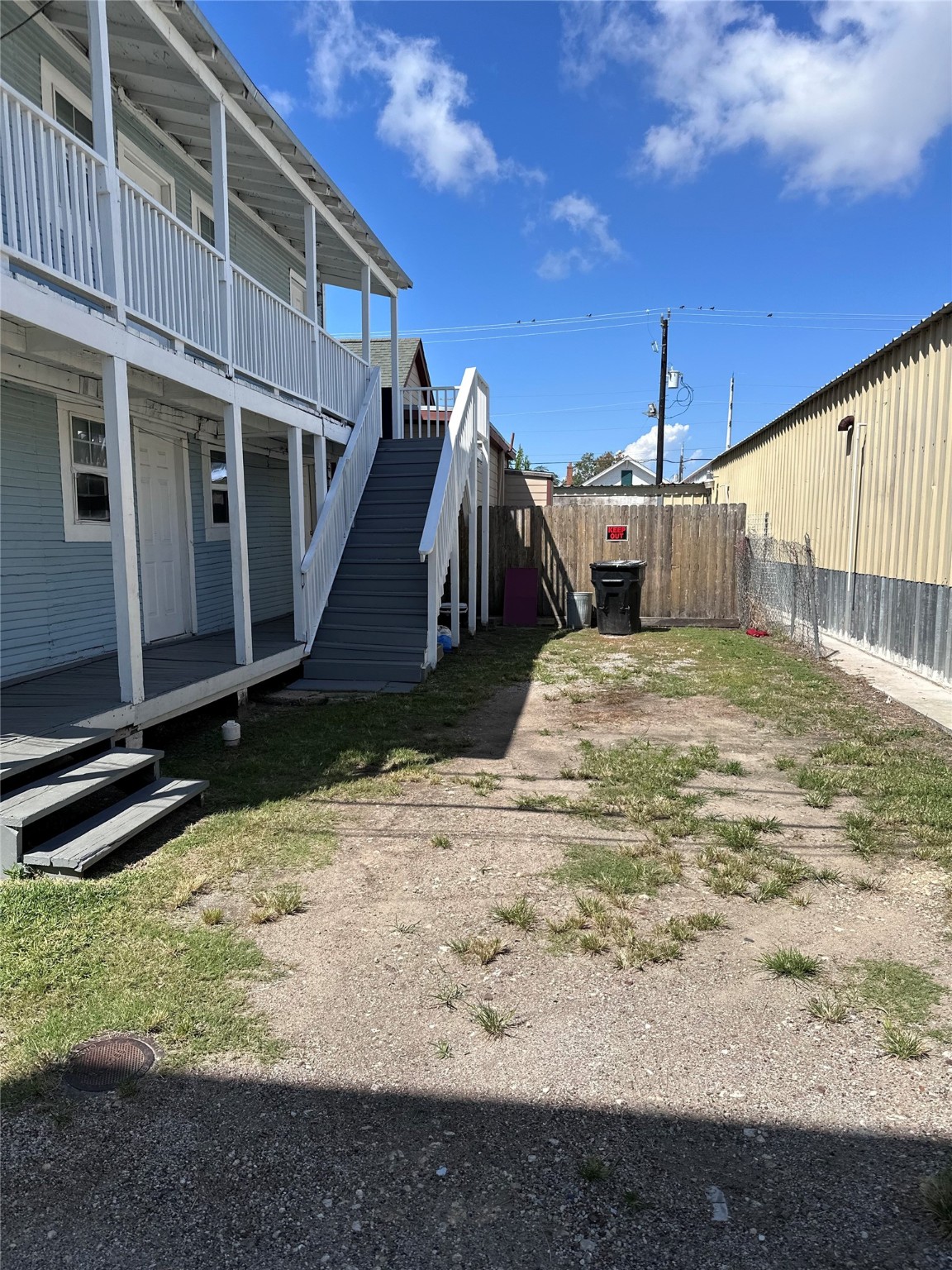 910 37th Street, Unit 3 Galveston, TX 77550 - Photo 18 of 18 a view of a backyard of the house