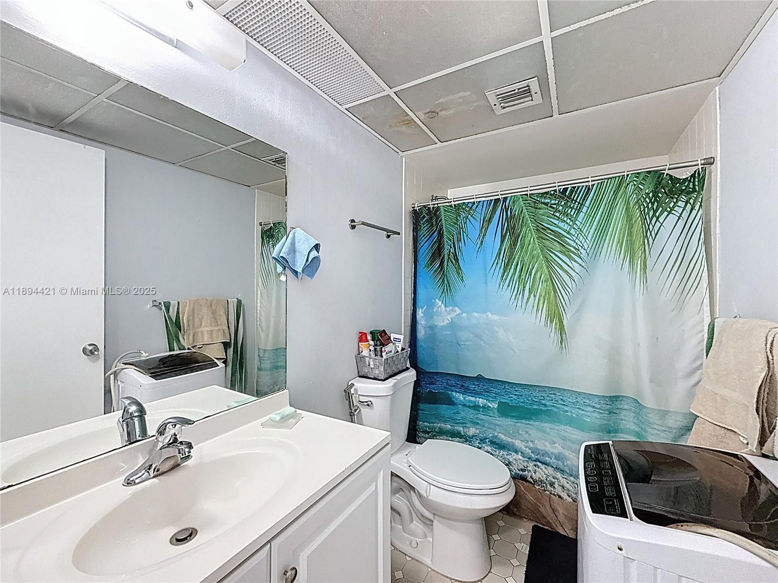 3611 Southwest 117th Avenue, Unit 10207 Miami, FL 33175 - Photo 18 of 35 a bathroom with a sink toilet and shower