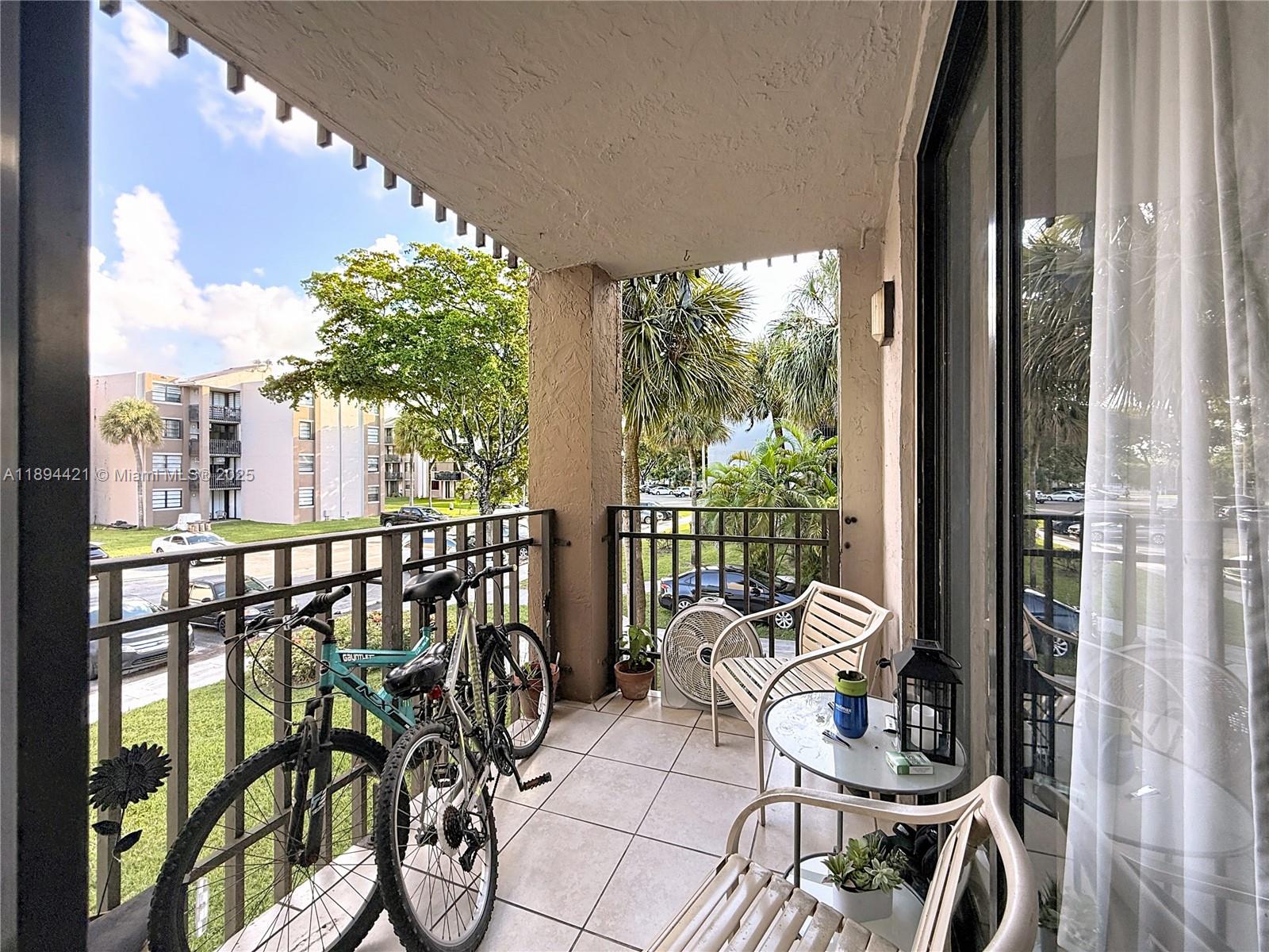 3611 Southwest 117th Avenue, Unit 10207 Miami, FL 33175 - Photo 21 of 35 a view of balcony and patio
