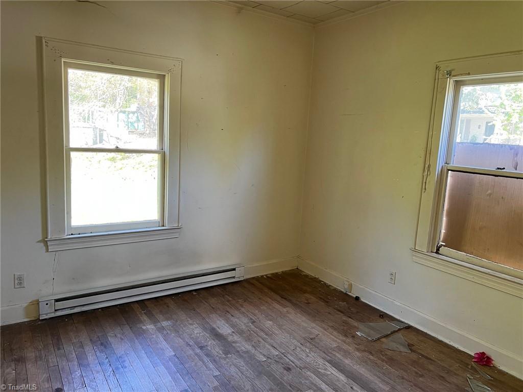 1206 Adams Street High Point, NC 27262 - Photo 10 of 10 Second bedroom also features wood flooring and windows.
