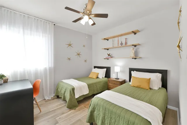 a room with furniture and wooden floor