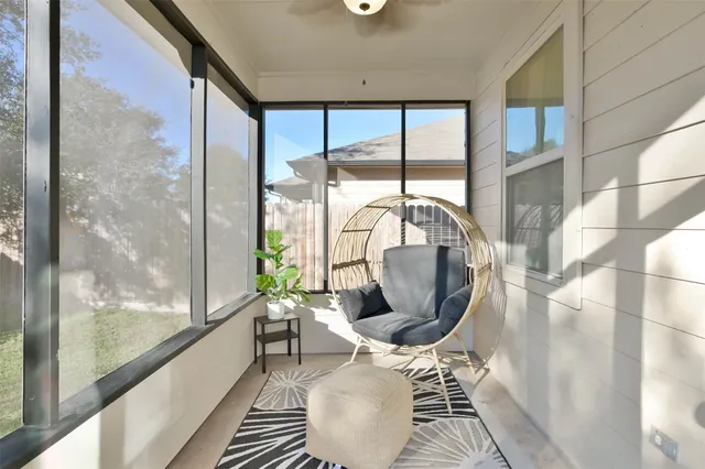 a view of entryway with wooden floor and door