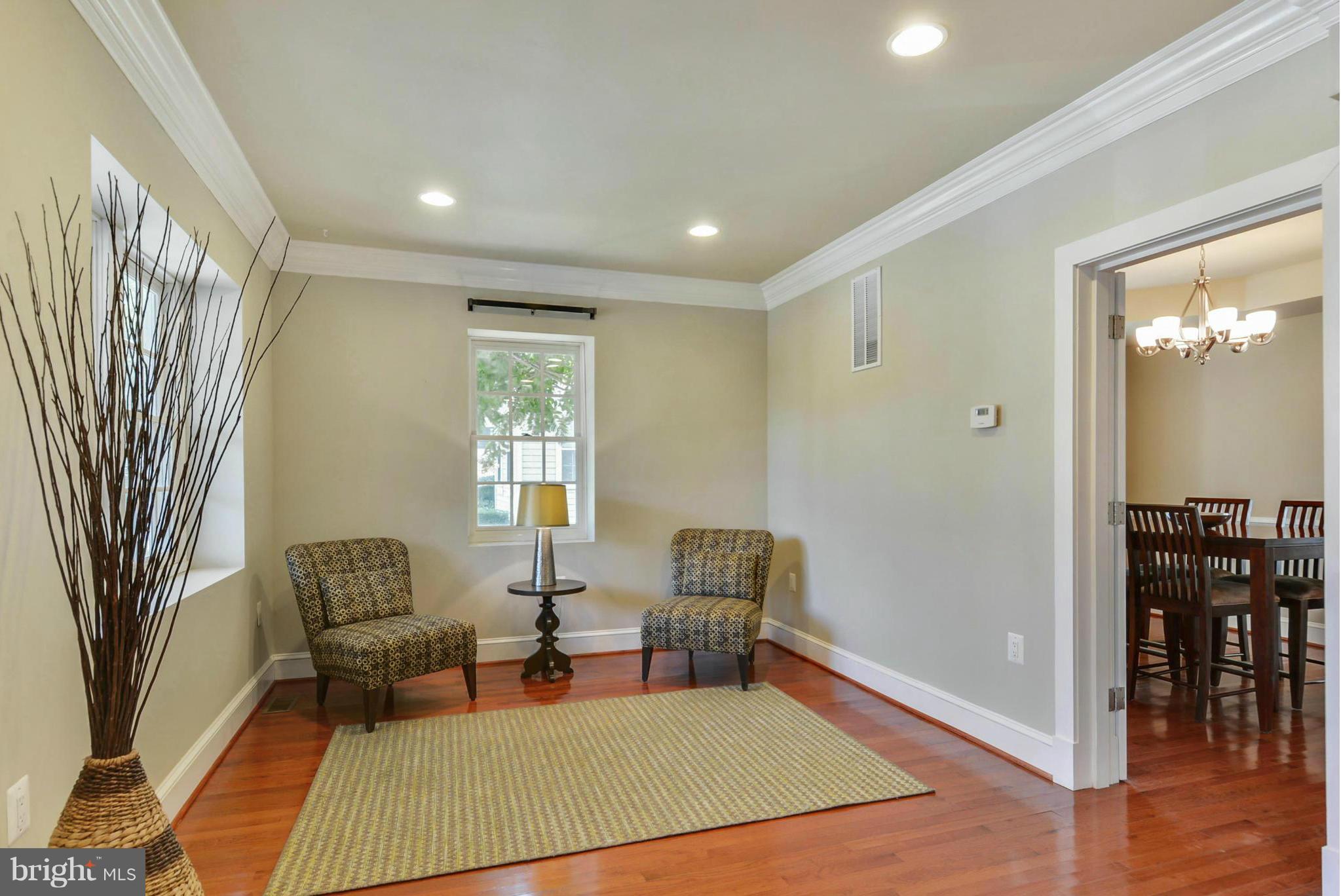 8822 1st Avenue Silver Spring, MD 20910 - Photo 6 of 30 a living room with furniture and wooden floor