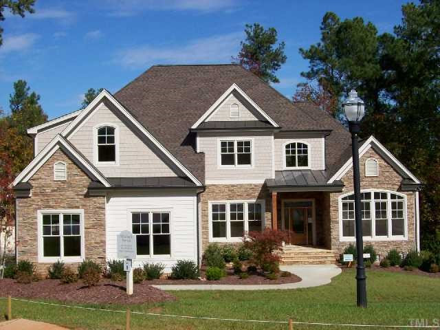 3910 Bending Birch Drive, Unit LT 8 Raleigh, NC 27613 - Photo 1 of 12 Beautiful exterior with shake and metal roof accents