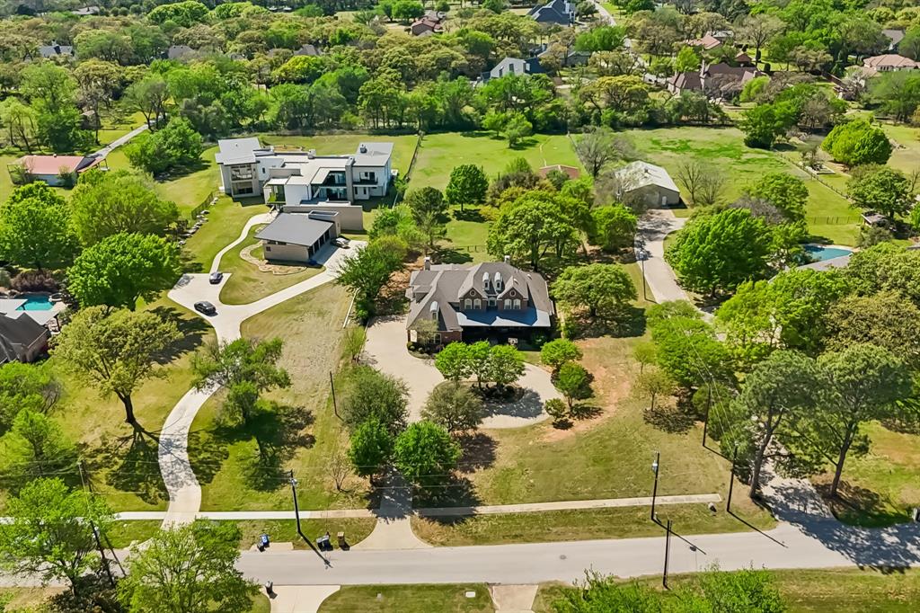 4604 Bill Simmons Road Colleyville, TX 76034 - Photo 8 of 22 an aerial view of residential houses with outdoor space