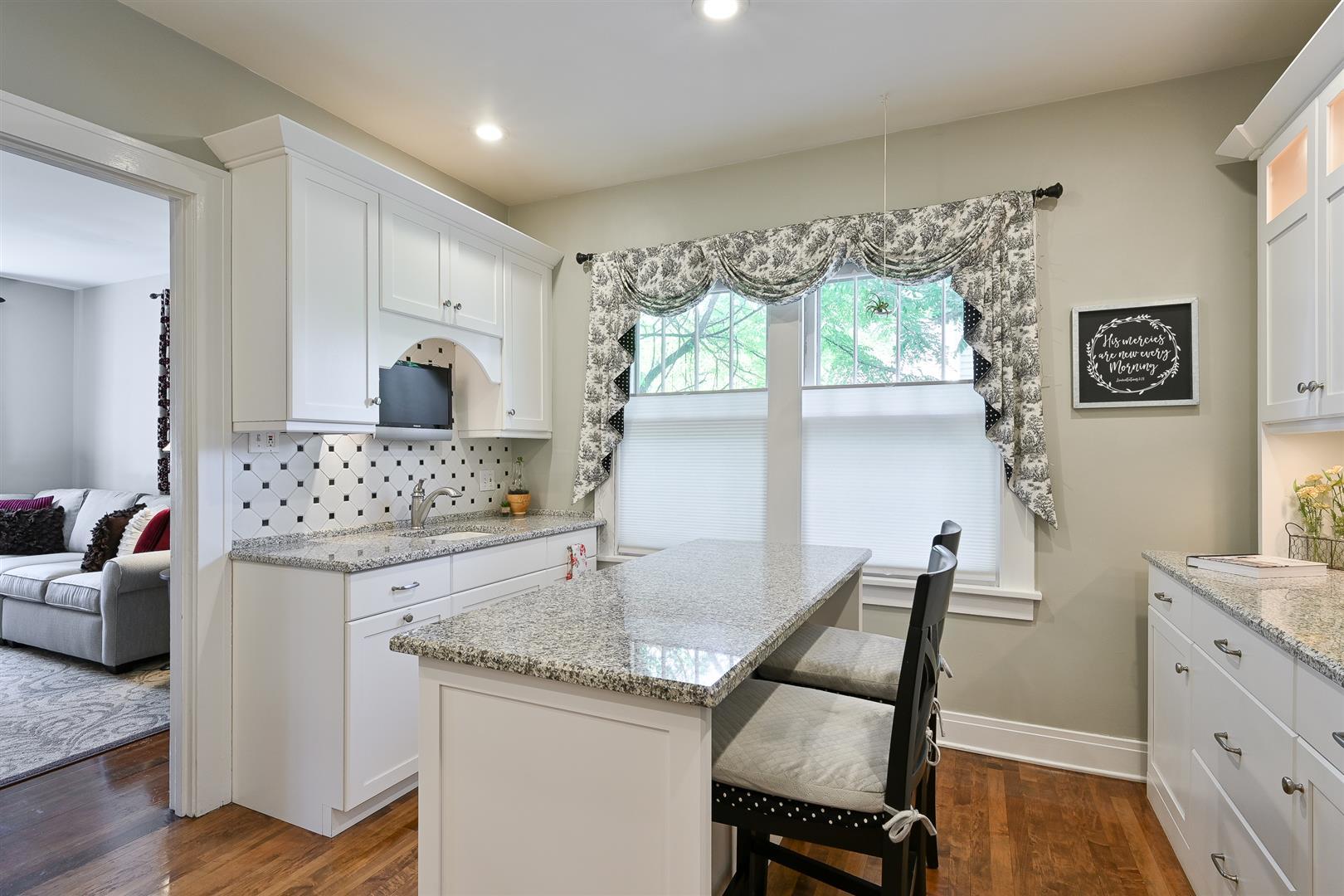804 Warrenville Road Wheaton, IL 60189 - Photo 11 of 30 a view of a kitchen area with furniture and a window