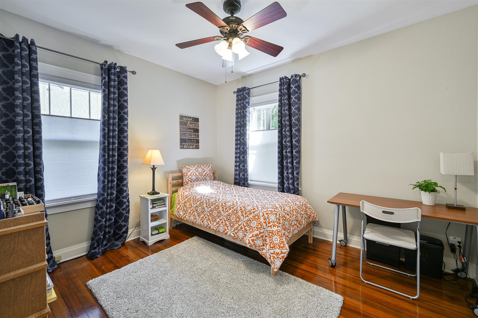 804 Warrenville Road Wheaton, IL 60189 - Photo 13 of 30 a bedroom with a bed and a window