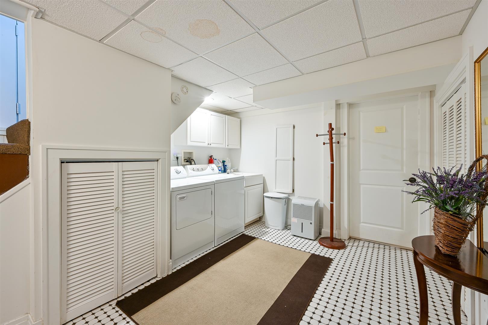 804 Warrenville Road Wheaton, IL 60189 - Photo 16 of 30 a room with a white cabinets and appliances
