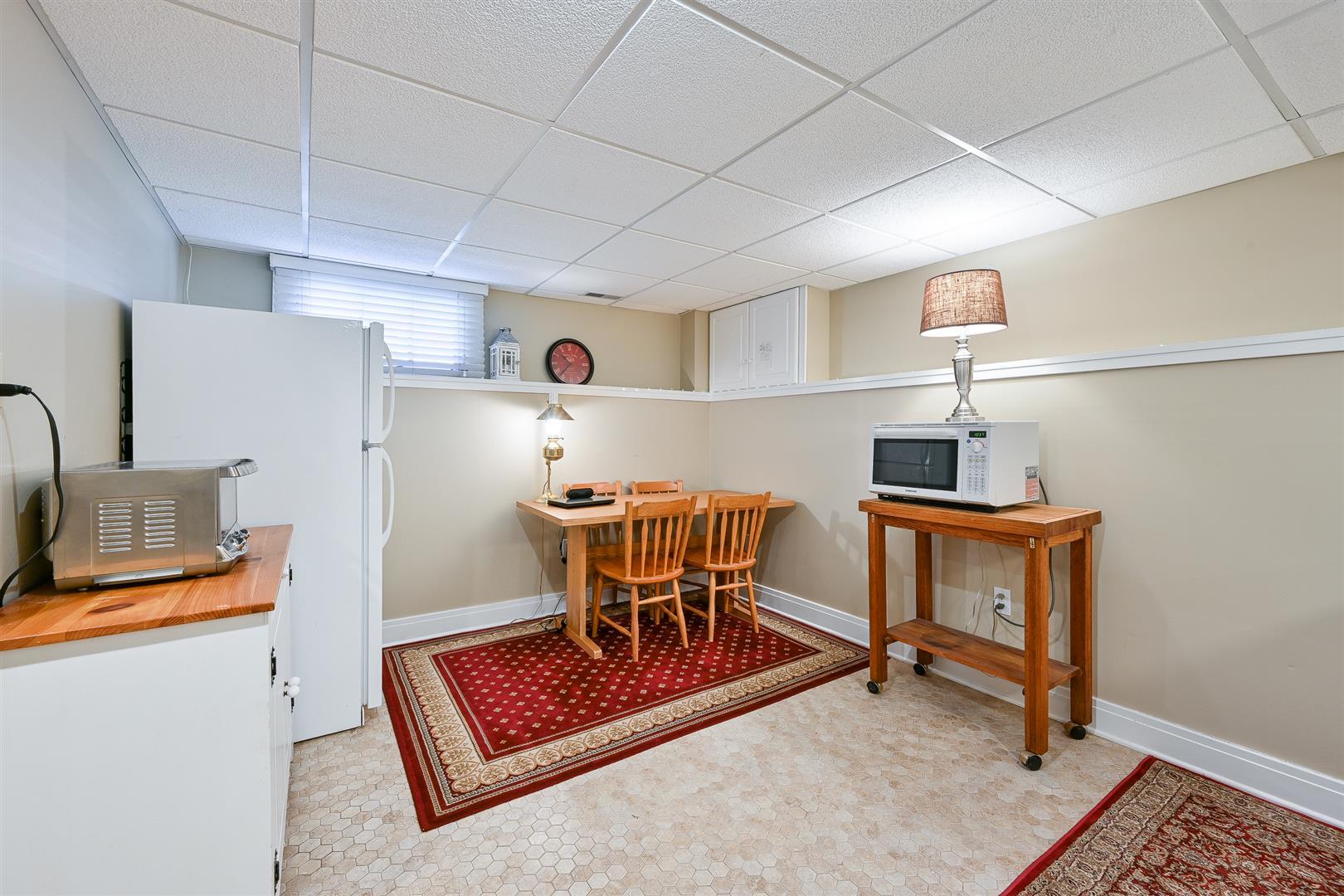 804 Warrenville Road Wheaton, IL 60189 - Photo 20 of 30 a workspace room with furniture and wooden floor