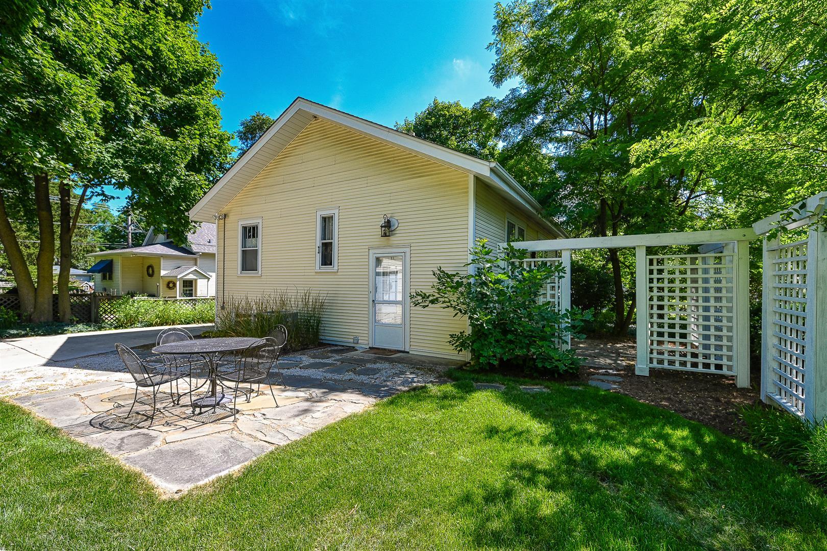 804 Warrenville Road Wheaton, IL 60189 - Photo 26 of 30 a view of a house with backyard and garden