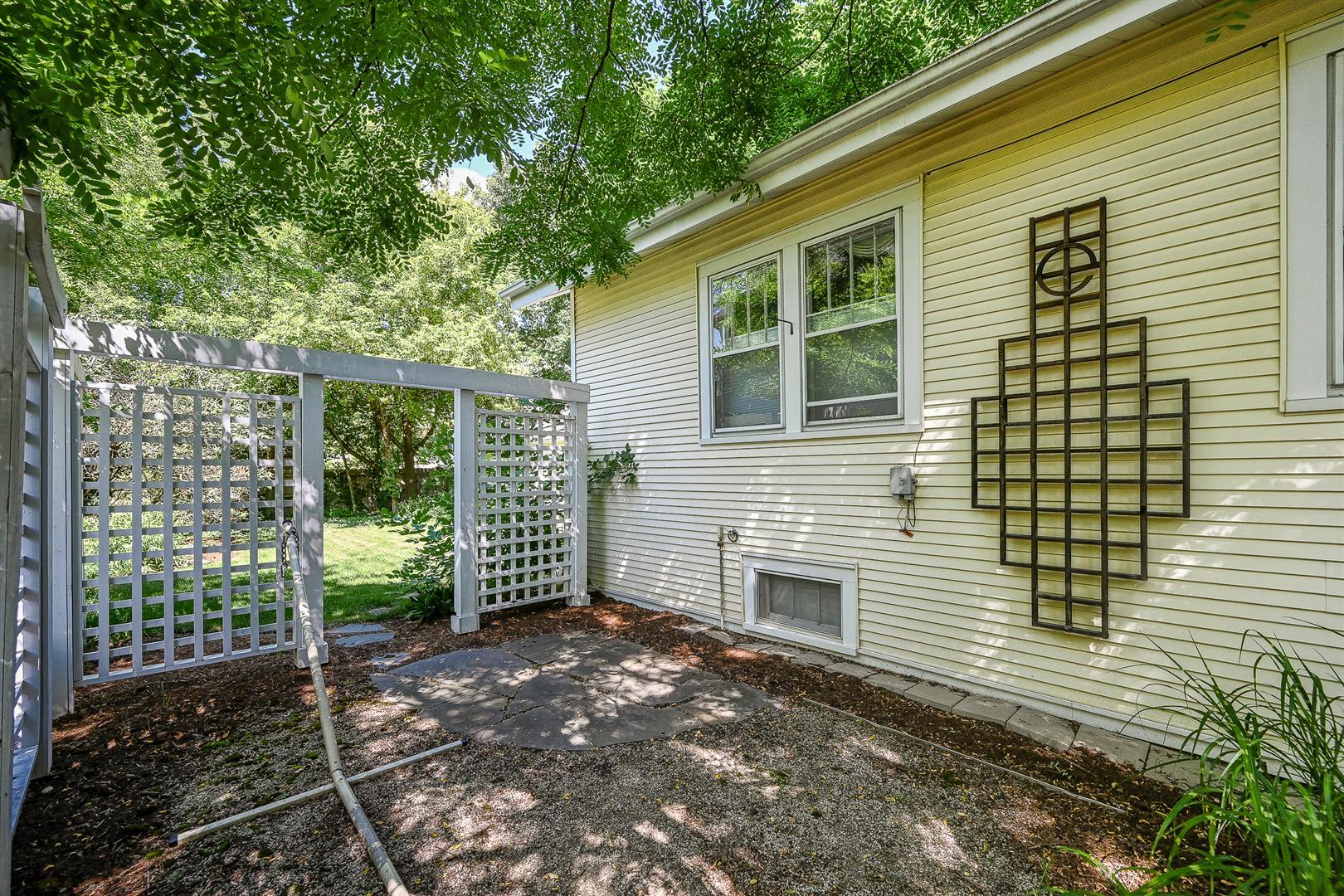 804 Warrenville Road Wheaton, IL 60189 - Photo 28 of 30 a view of a house with a yard