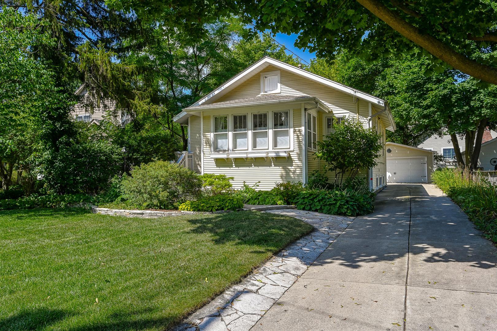804 Warrenville Road Wheaton, IL 60189 - Photo 29 of 30 a front view of house with a garden