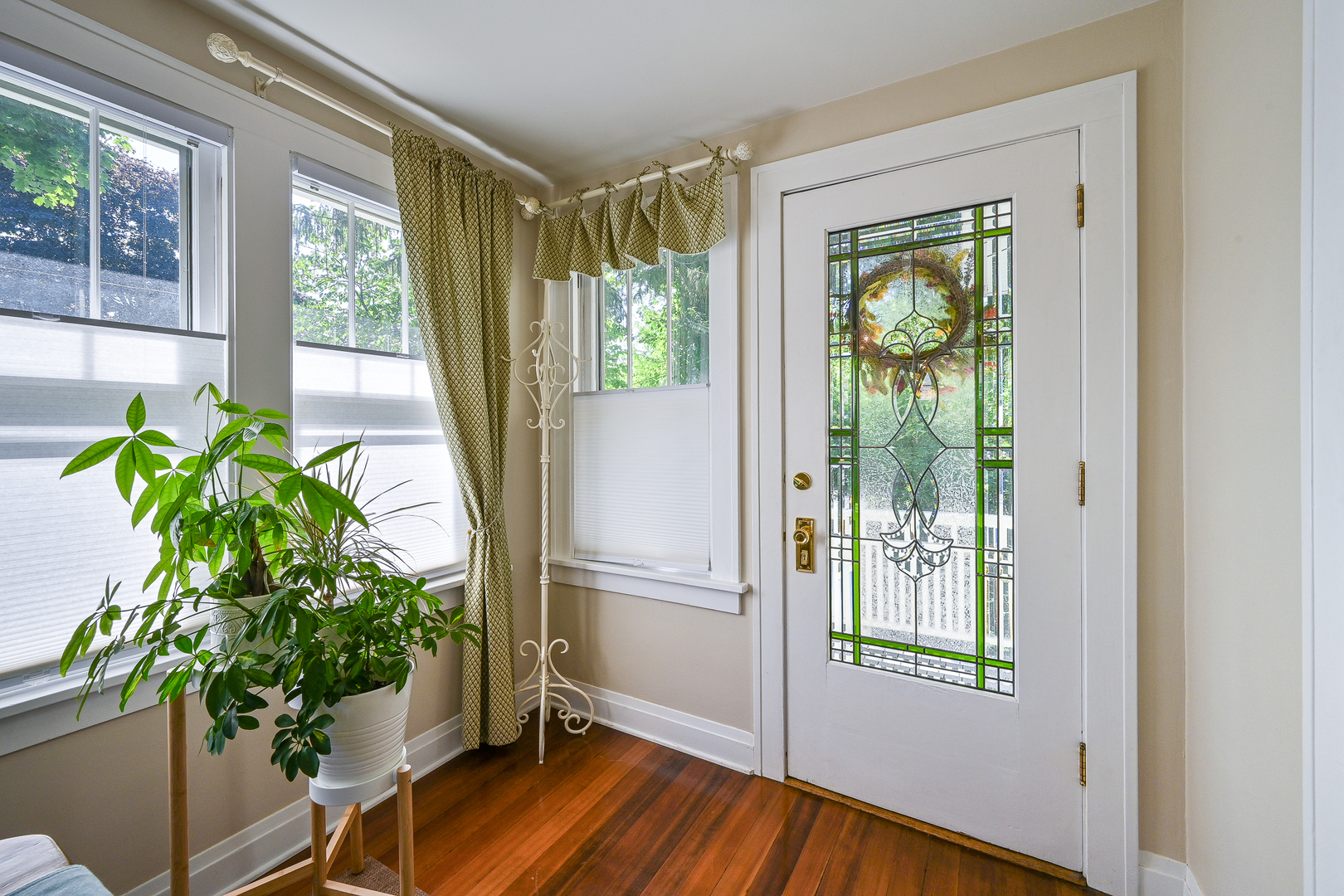 804 Warrenville Road Wheaton, IL 60189 - Photo 4 of 30 a room with window and wooden floor