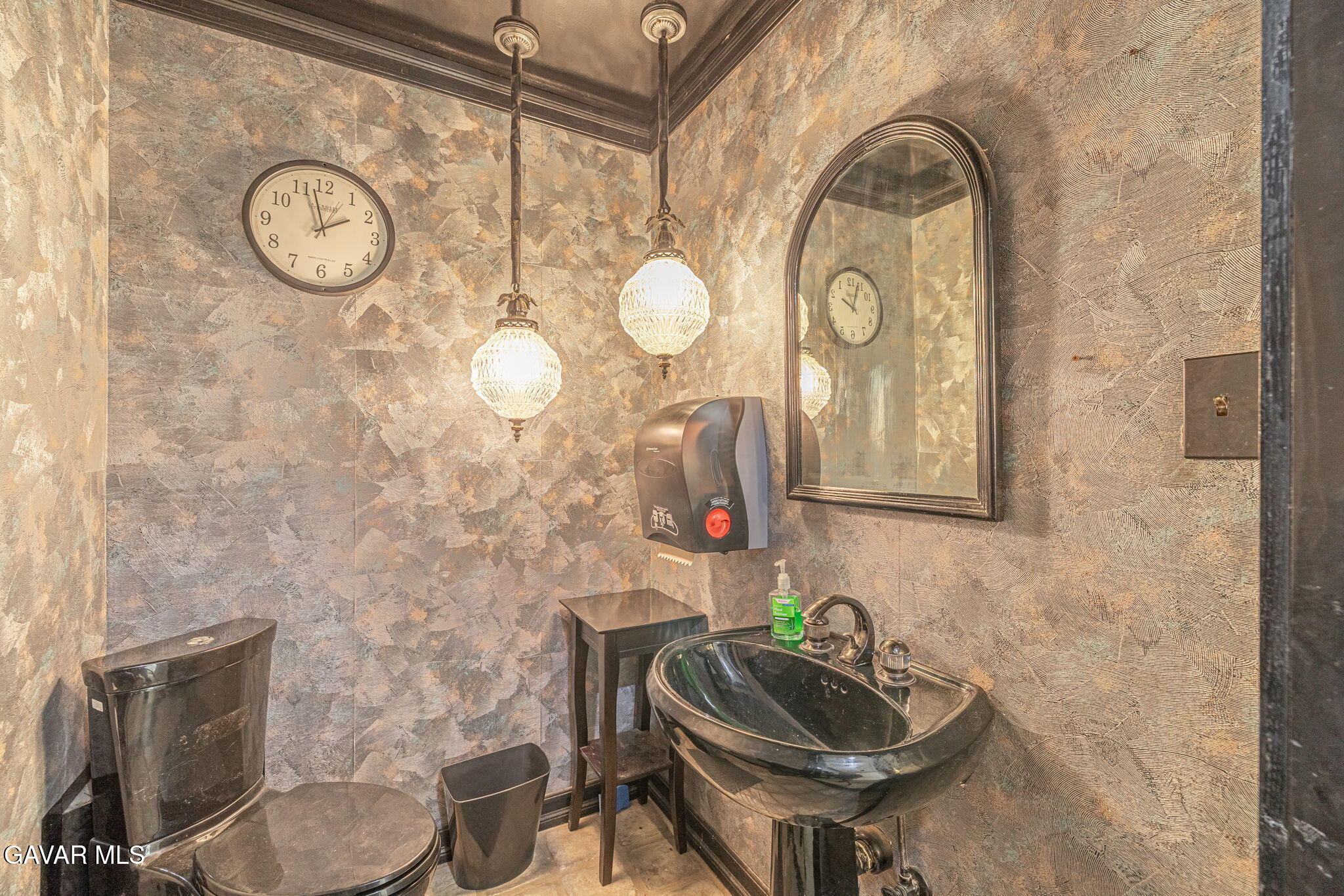 4819 Columbia Way Lancaster, CA 93536 - Photo 15 of 33 a bathroom with a toilet mirror and sink