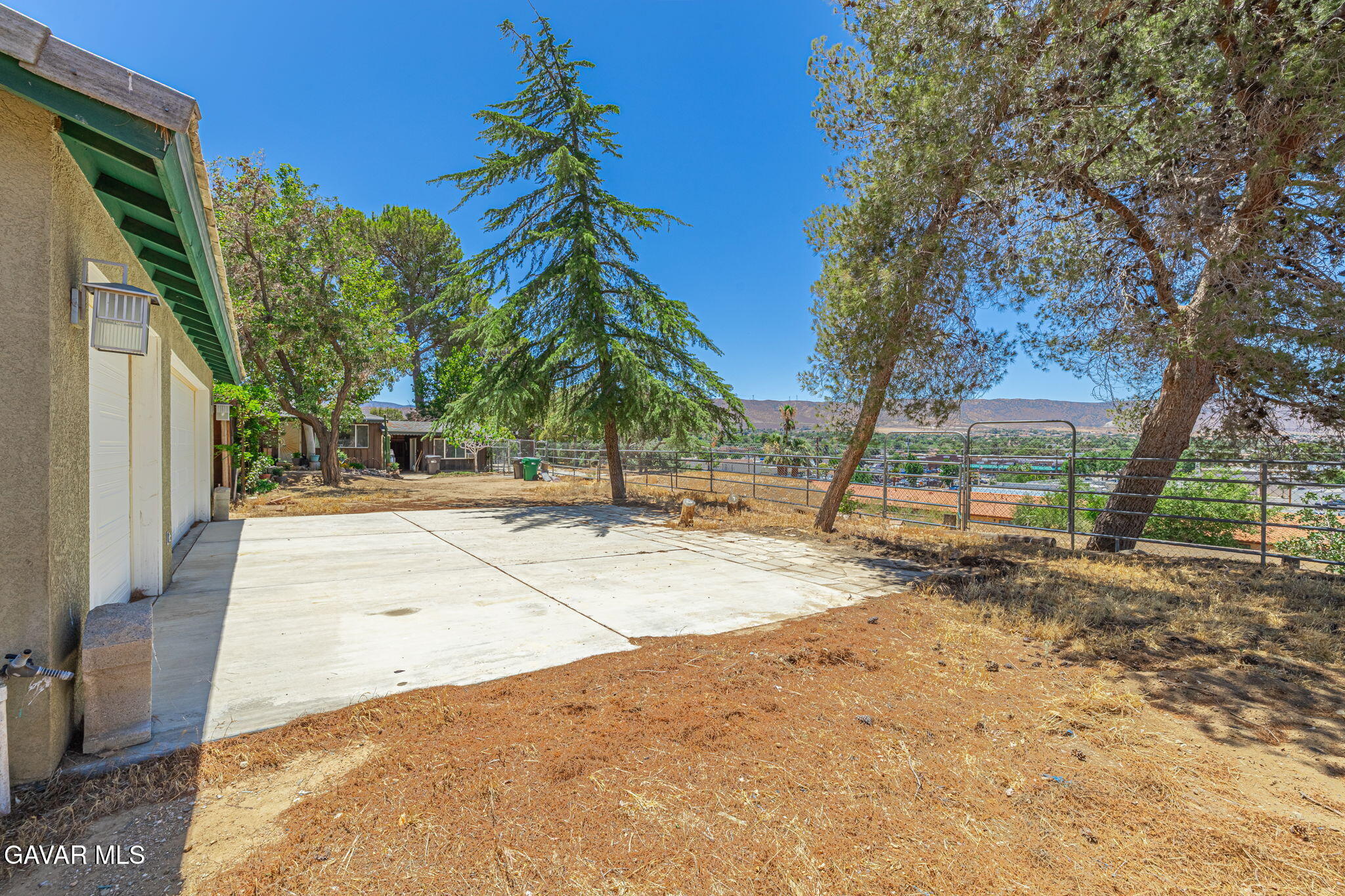 4819 Columbia Way Lancaster, CA 93536 - Photo 20 of 33 a view of a yard with plants and trees