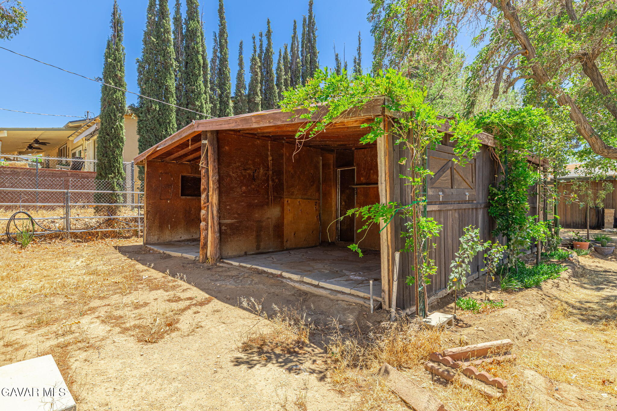 4819 Columbia Way Lancaster, CA 93536 - Photo 24 of 33 a view of a house with a yard and plants
