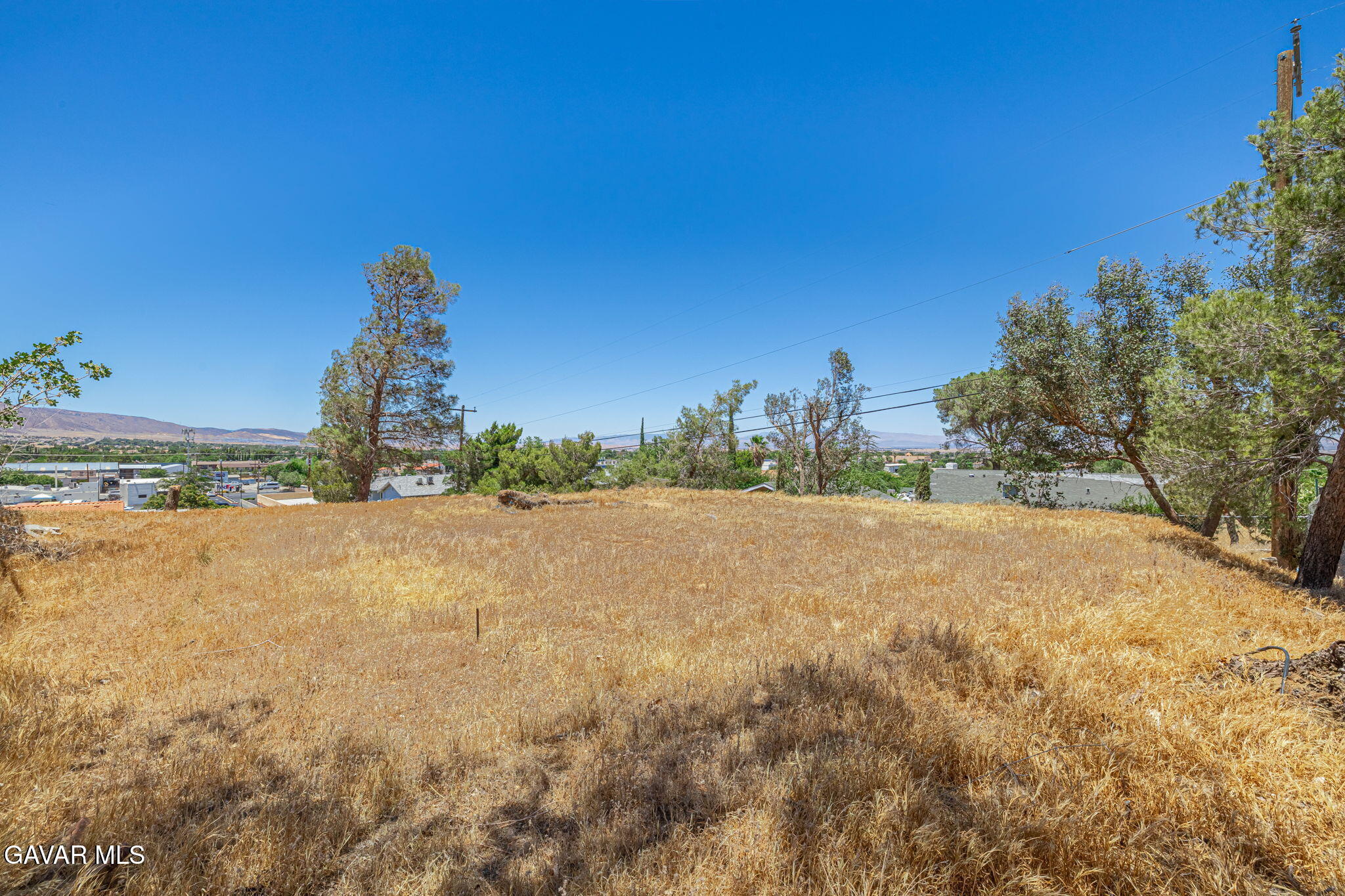 4819 Columbia Way Lancaster, CA 93536 - Photo 27 of 33 a view of a house with a yard and sitting area