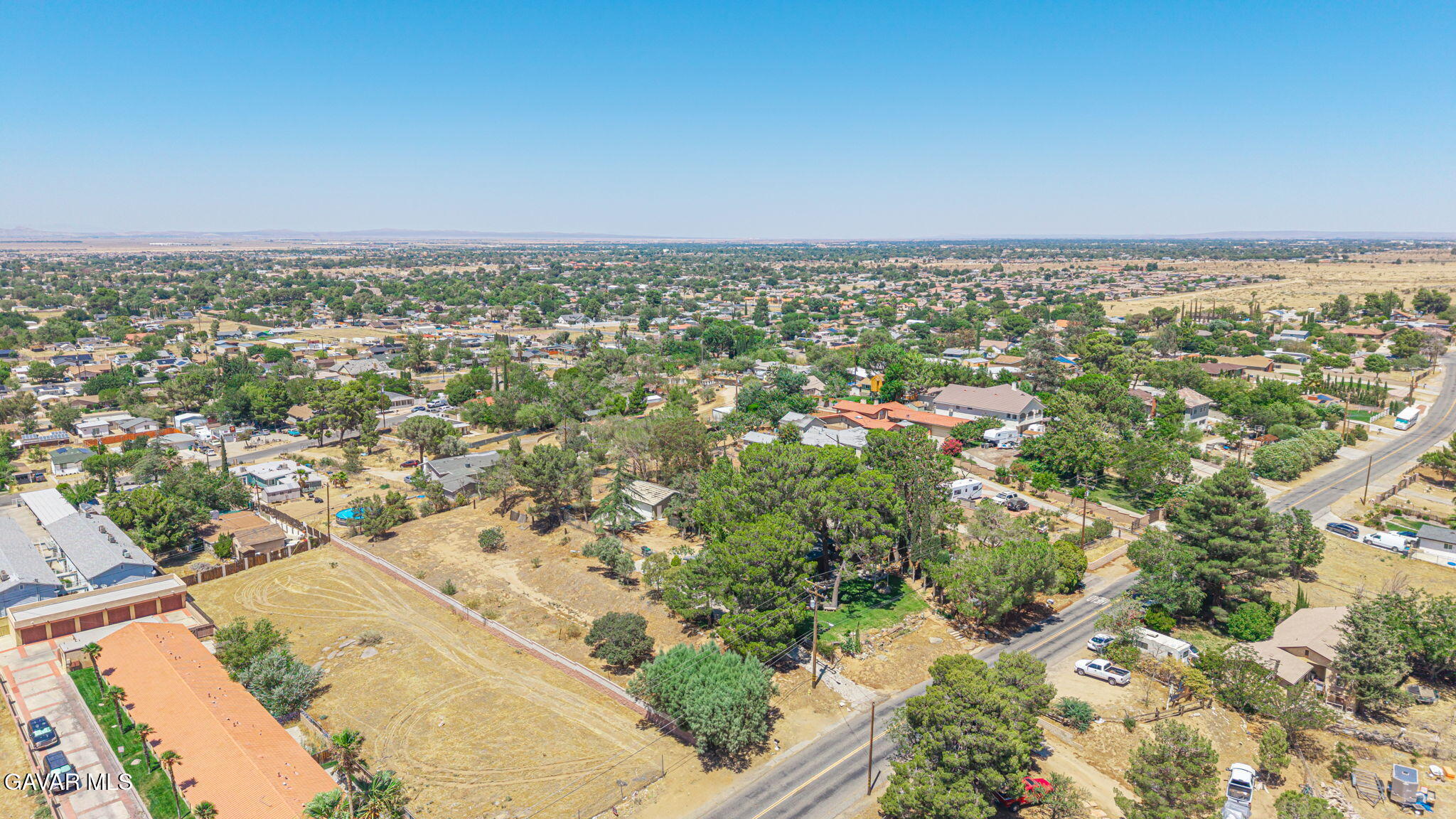 4819 Columbia Way Lancaster, CA 93536 - Photo 30 of 33 an aerial view of residential building and trees around