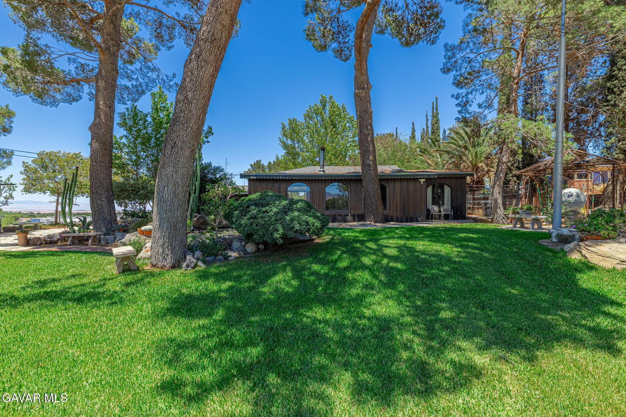 4819 Columbia Way Lancaster, CA 93536 - Photo 3 of 33 a view of a house with a back yard