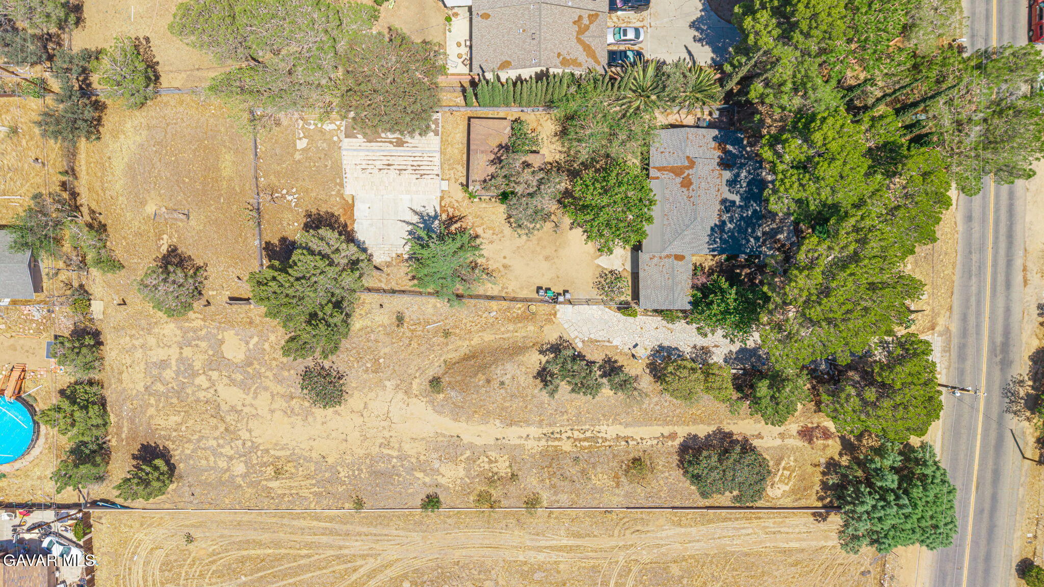 4819 Columbia Way Lancaster, CA 93536 - Photo 31 of 33 a view of a garden with a fountain