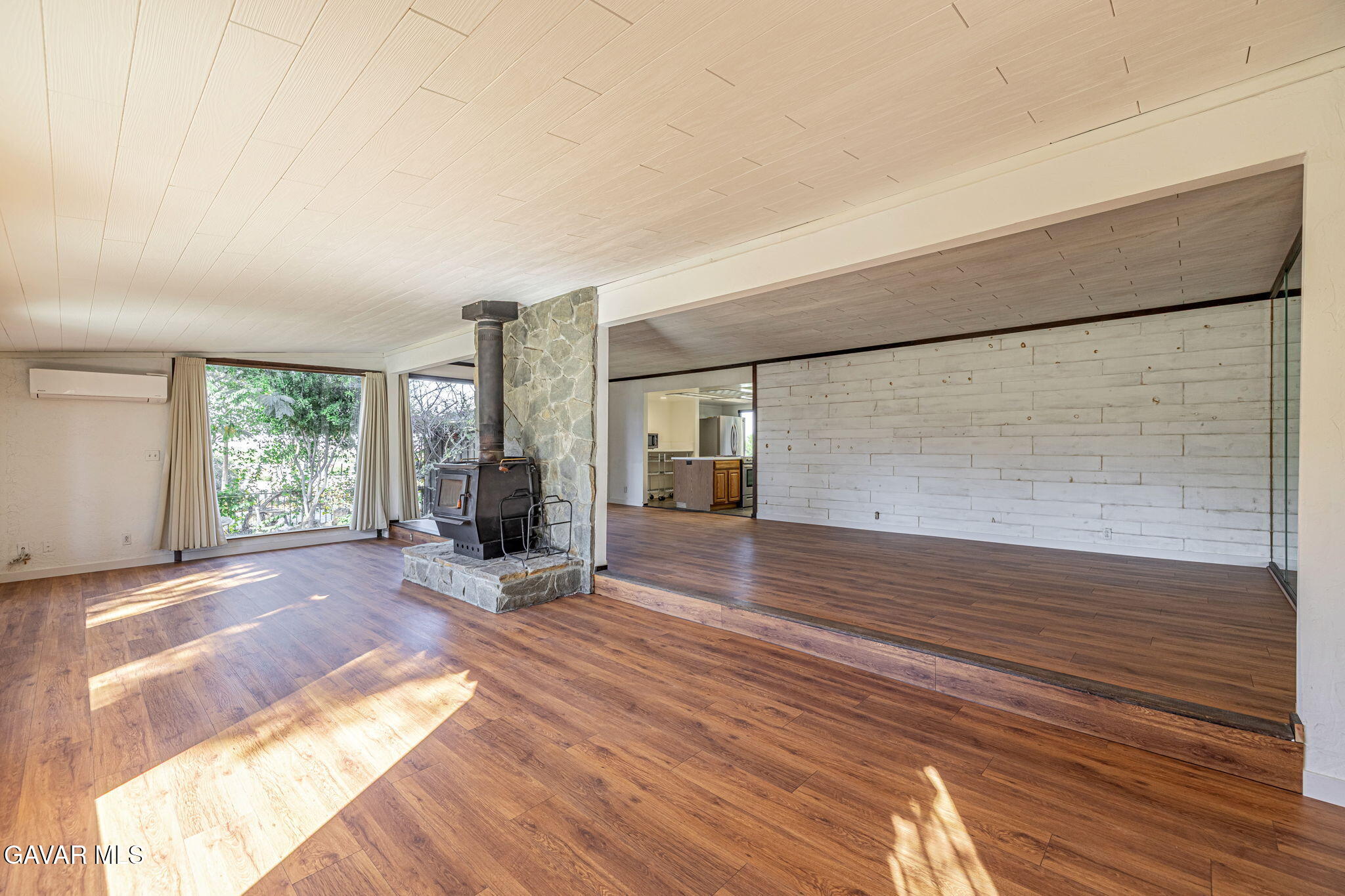4819 Columbia Way Lancaster, CA 93536 - Photo 7 of 33 a view of a livingroom with wooden floor and furniture