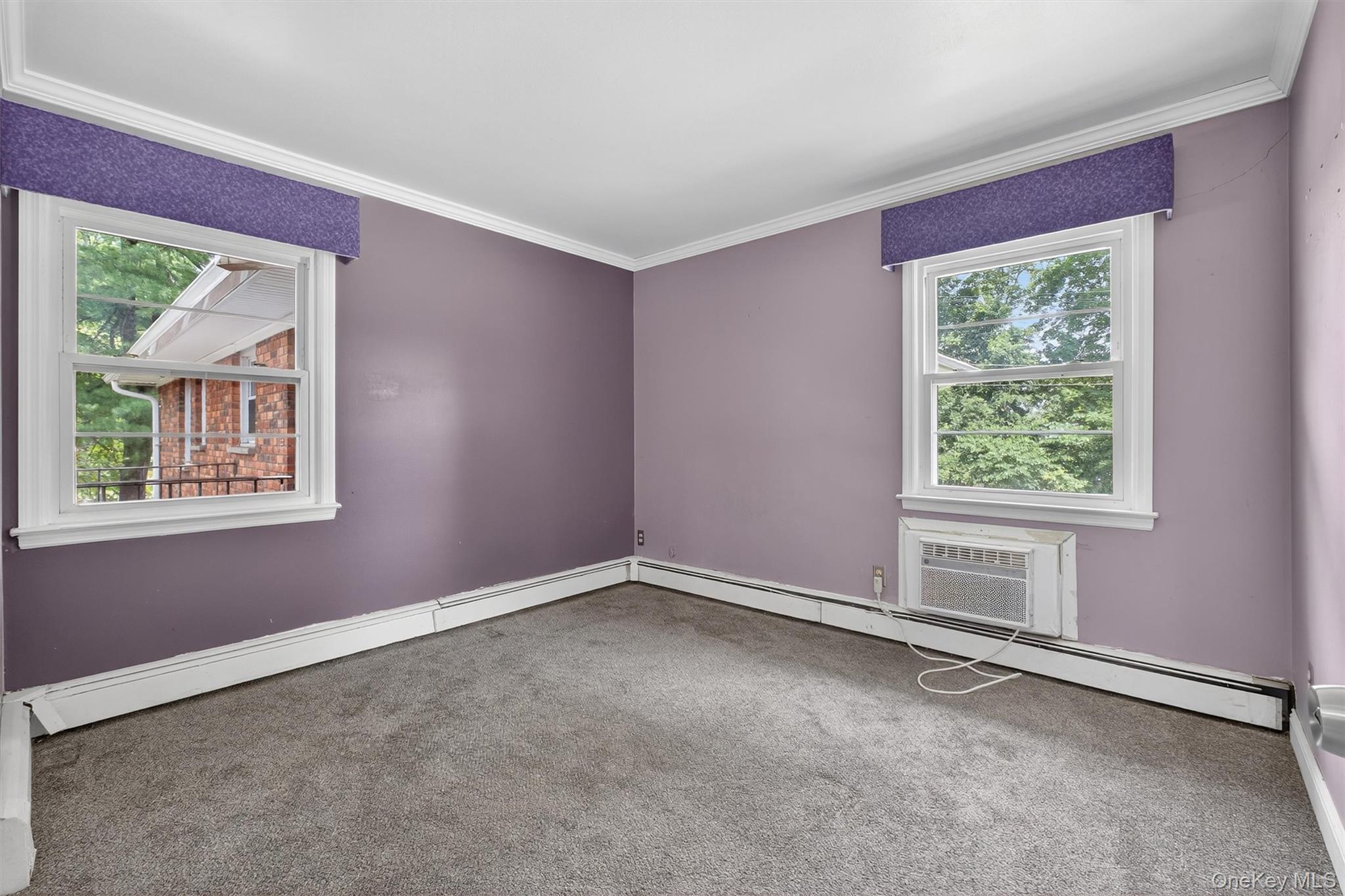 2710 South Road, Unit A4 Poughkeepsie, NY 12601 - Photo 16 of 17 a view of an empty room with a window