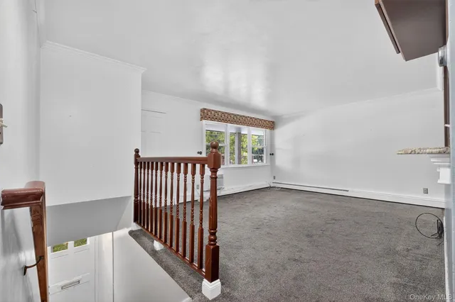 a view of a livingroom with a staircase