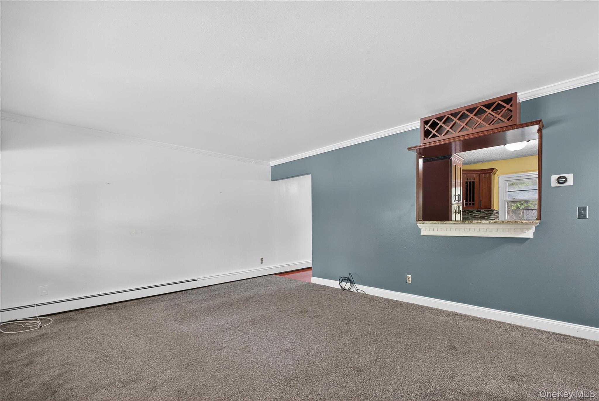 2710 South Road, Unit A4 Poughkeepsie, NY 12601 - Photo 4 of 17 an empty room with windows