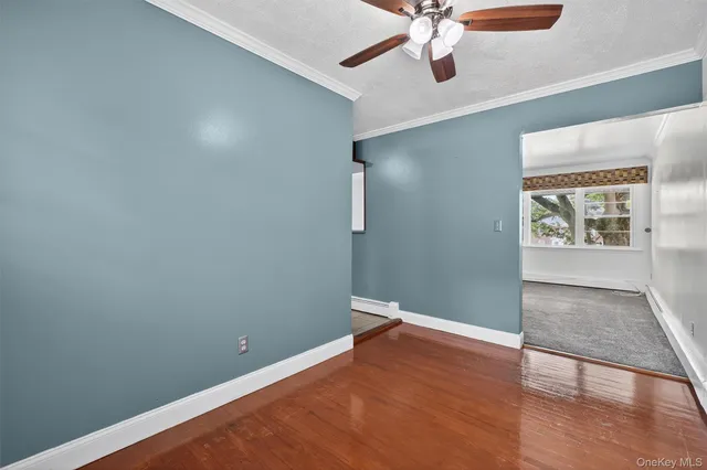 a kitchen with a refrigerator and a sink