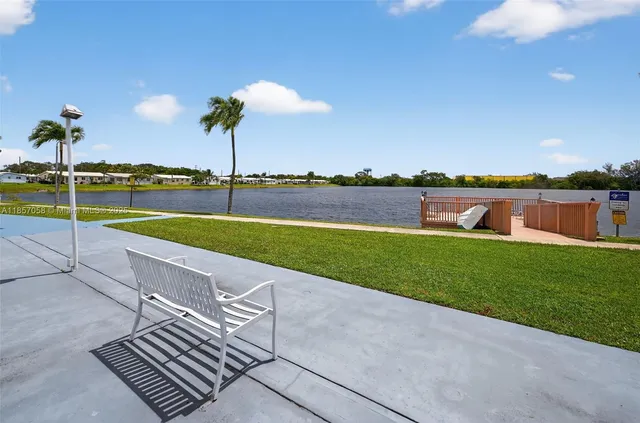 a view of a chairs and table on the wooden floor