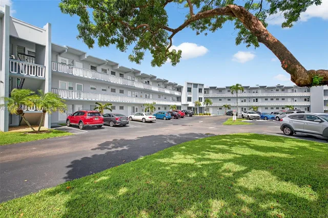a cars parked in front of a building