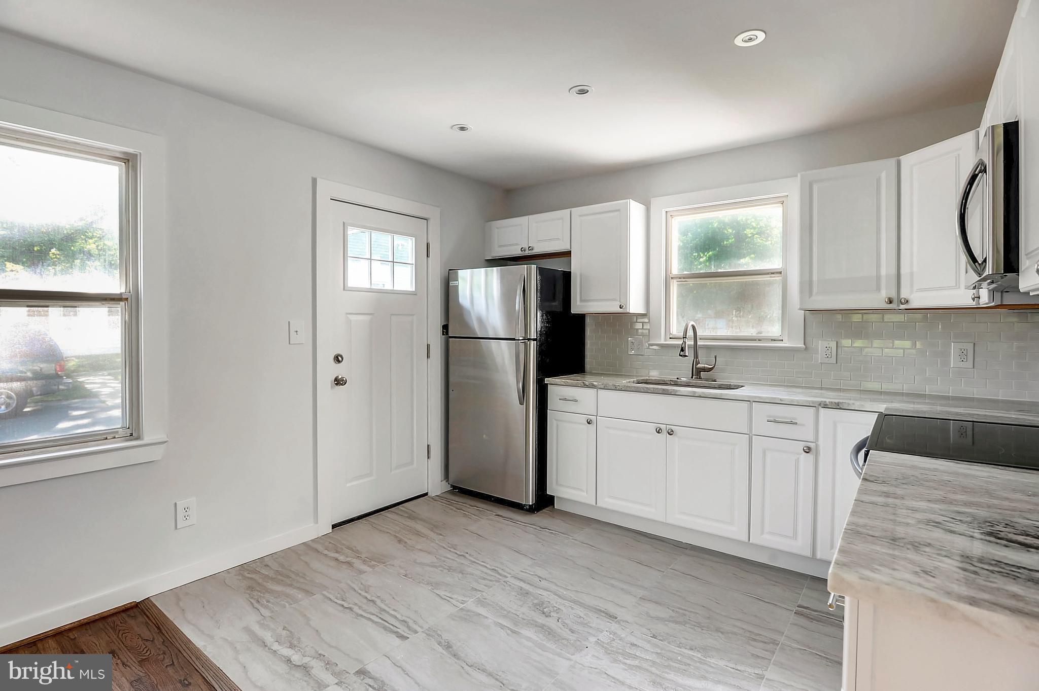 6507 Woodley Road Clinton, MD 20735 - Photo 9 of 28 Beautiful Tile & Granite
