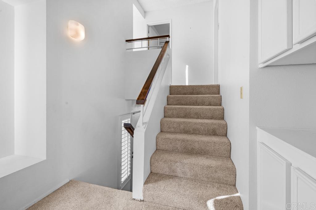 1446 Finch Street El Cajon, CA 92020 - Photo 18 of 35 a view of staircase with white walls