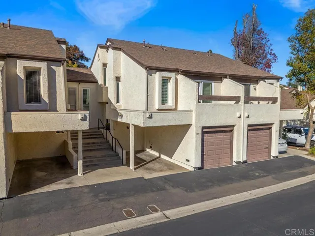 front view of a house with a street