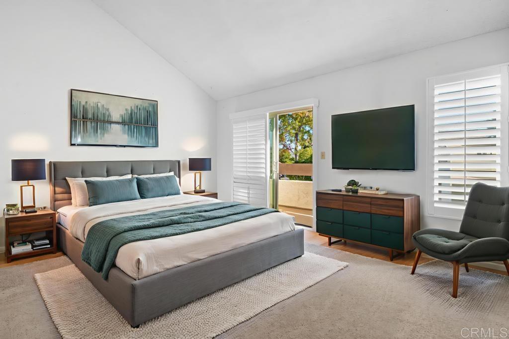 1446 Finch Street El Cajon, CA 92020 - Photo 3 of 35 a bedroom with a bed and a flat screen tv