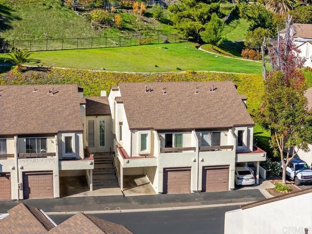 front view of a building with a yard