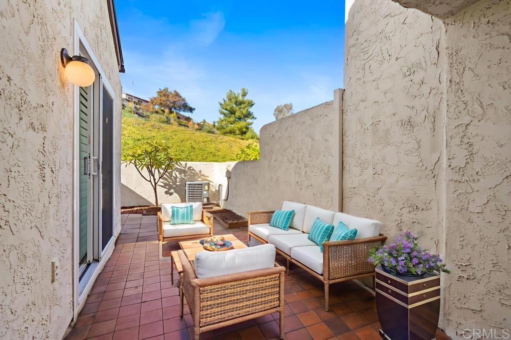 1446 Finch Street El Cajon, CA 92020 - Photo 4 of 35 a outdoor living room with furniture and a potted plant