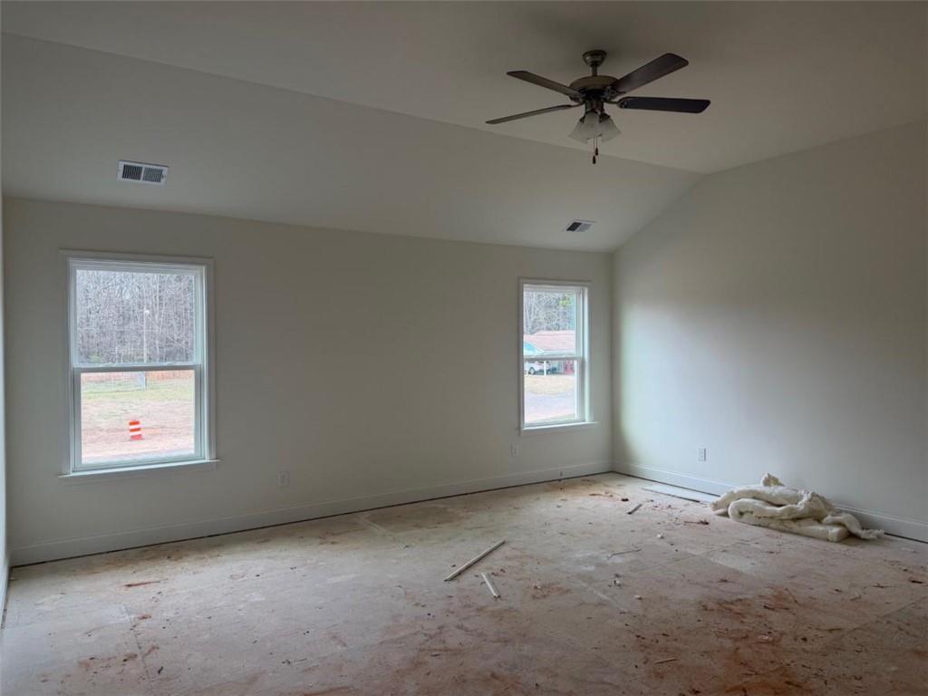 41 Woodland Road Covington, GA 30016 - Photo 17 of 46 a view of a window in an empty room