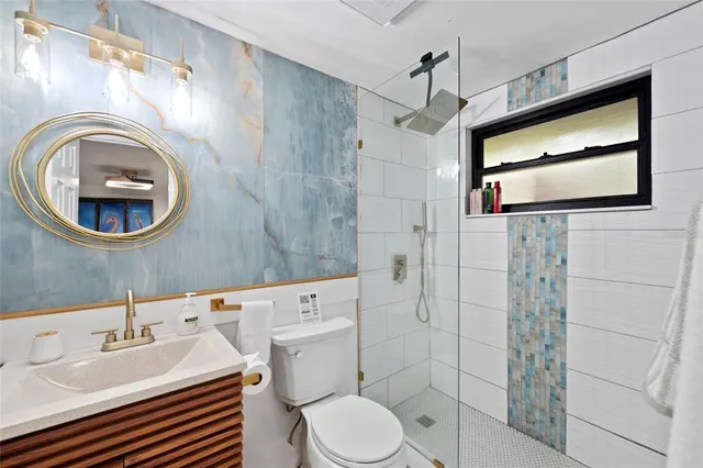 a bed room with a bed and a window